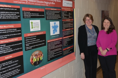 Occupational therapy assistant instructors Laurel Radley and Anna Walls pose with poster Radley will present at a conference