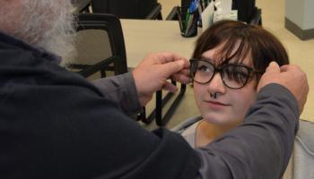 Bella Clonch is fitted with her new glasses