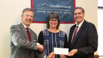 Photo of Brett Woods, Lisa Leather and Dr. Don Tomas