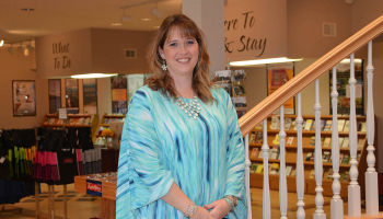 Woman poses for photo indoors