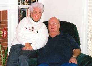 Woman and man sit together