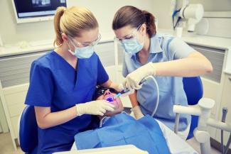 A client receives dental care