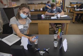 Student participates in STEM activity