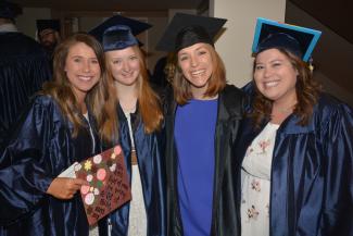 Four graduates