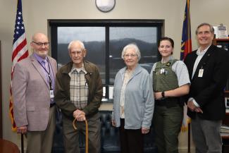 Holly Bates (fourth from left) of Franklin is the first recipient of “The George Moses Family Scholarship,” which will be awarded annually to a recruit in the Basic Law Enforcement Training program at Southwestern Community College’s Public Safety Training Center. Pictured with Bates are, from left: Curtis Dowdle, SCC’s Dean of Public Safety Training; George Moses, retired Macon County Sheriff; Margaret Moses; and Dr. Don Tomas, SCC’s President.