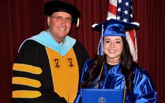 Jackson County graduate Sarah Jennings (right) with Dr. Don Tomas.