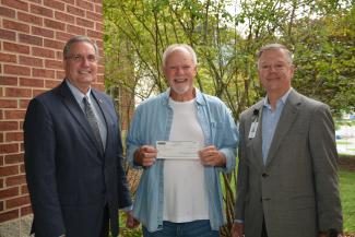 Mike Wade (center) of Cullowhee recently established a new endowed fund with the Southwestern Community College Foundation. When complete, it will be the largest endowed scholarship fund by a single individual in SCC history. Pictured with Wade are Dr. Don Tomas (left), SCC President, and Brett Woods, Director of the SCC Foundation.