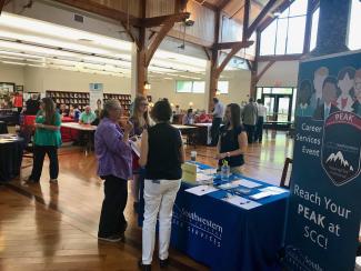 People interacting at job fair