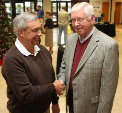 Burrell steps down